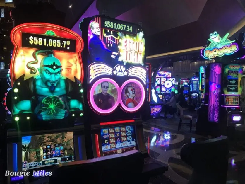 a group of slot machines in a casino