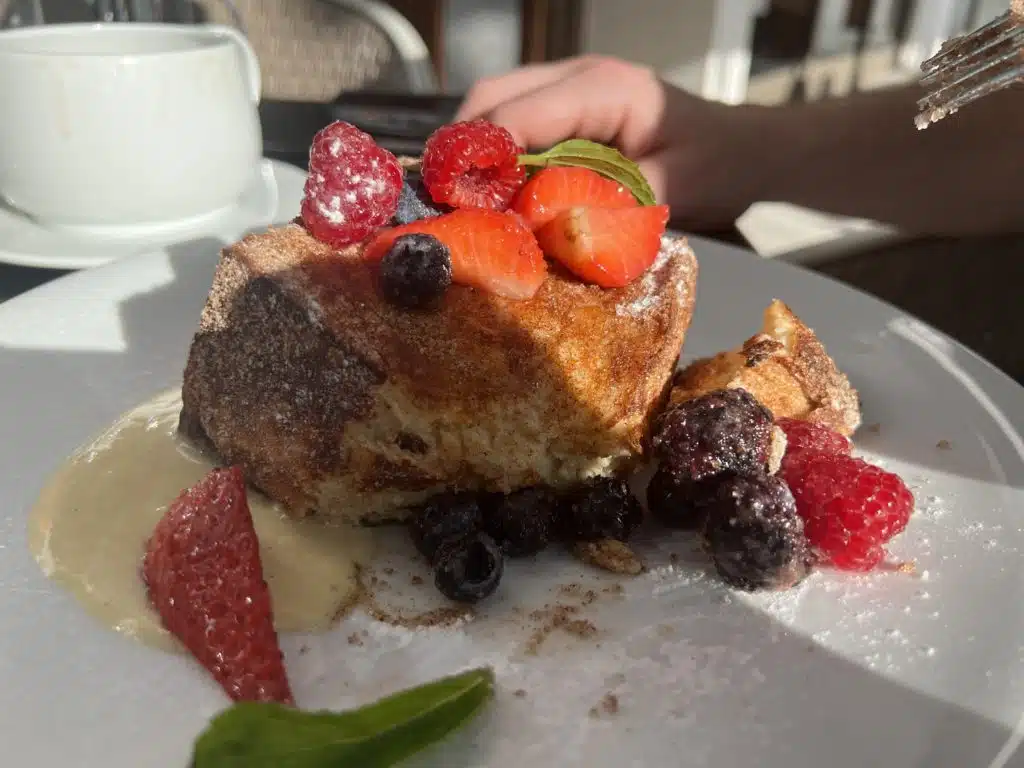 a plate of food with fruit on it