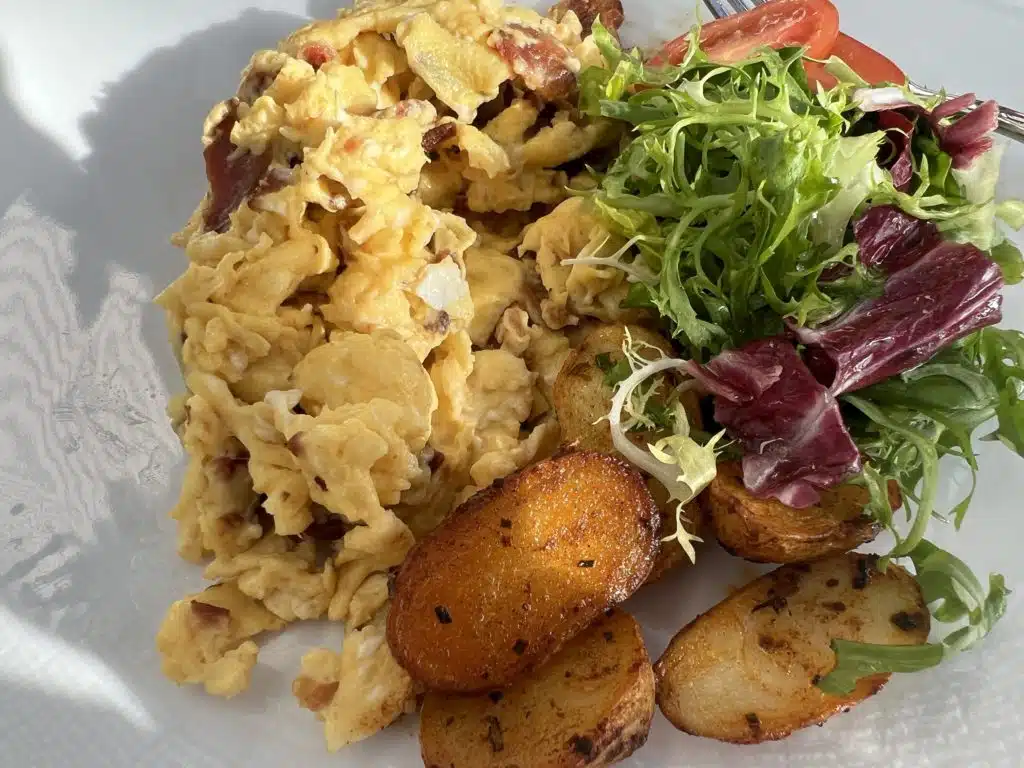 a plate of food with a fork and a plate of food